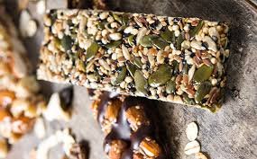 "A vibrant and nutritious seed bar with various healthy seeds and nuts, perfect for snacking and nourishment"