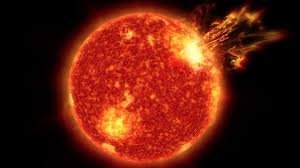 Solar Storm Alert: A massive solar flare erupts from the sun's surface, threatening Earth's magnetic field.