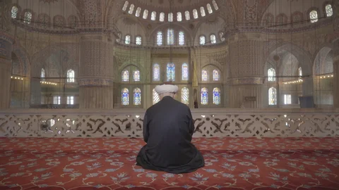 "Muslims performing Friday prayer in congregation"